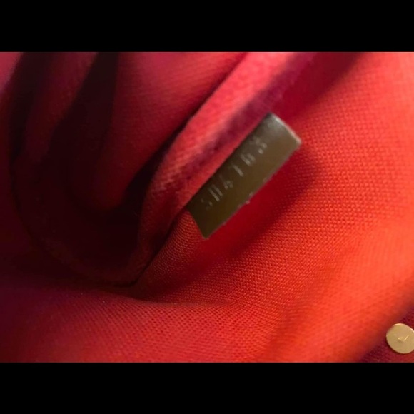 LOUIS VUITTON
Damier Ebene Eva Clutch - Picture 14 of 16